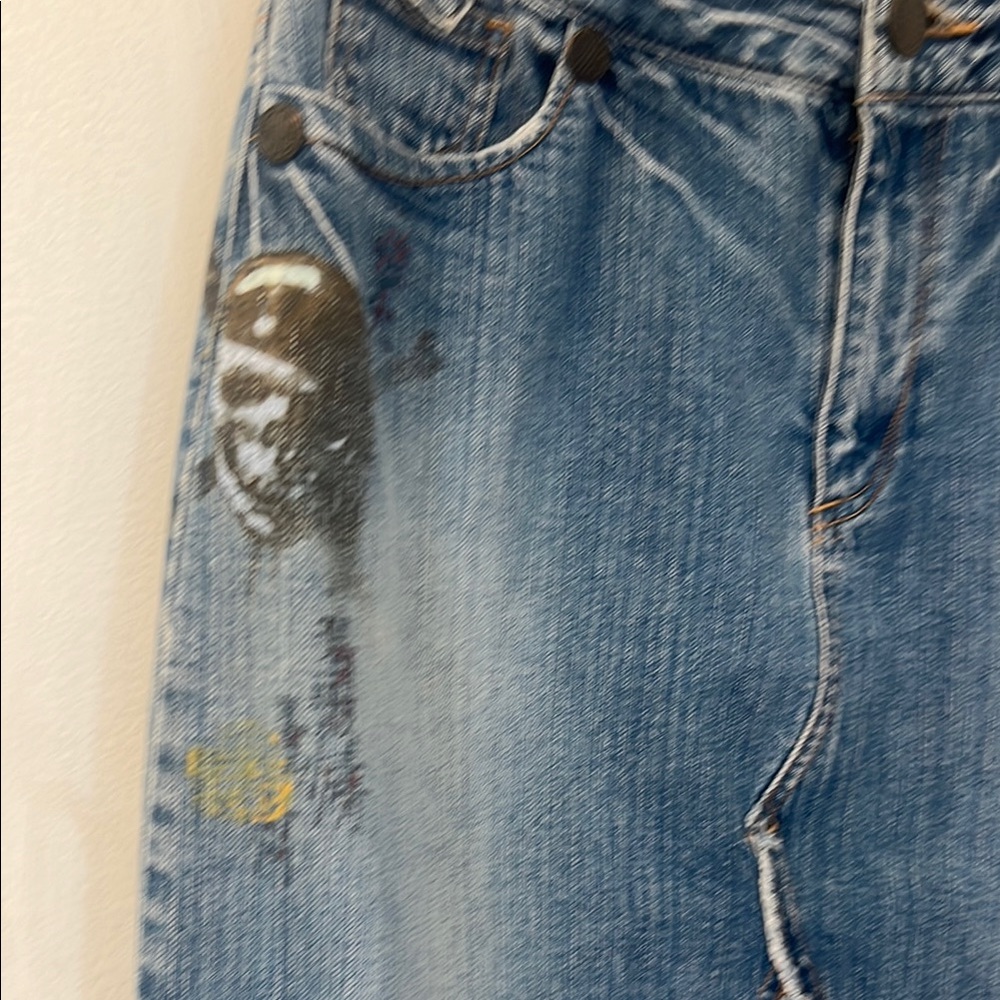 Official Disney Store, distressed Pirates of the Caribbean jean skirt